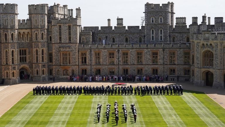 Royal Marines and members of the band line up during a ceremony to honour the Royal Navy personnel who took part in Queen Elizabeth II&#39;s funeral, in Windsor, Britain, May 30, 2023. REUTERS/Maja Smiejkowska/Pool
