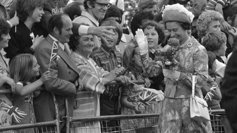 Flowers, flags and smiling Irish eyes greeted the Queen at the University of Ulster in 1977