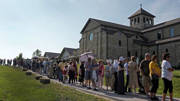 People wait to view the body of Sister Wilhelmina Lancaster at the Benedictines of Mary, Queen of Apostles  
Pic:AP