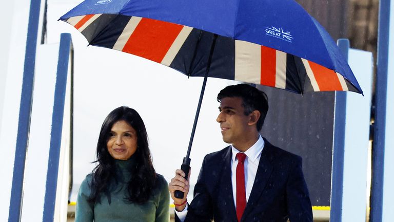 Bristish Prime Minister Rishi Sunak accompanied by his wife Akshata Murty, arrives at Hiroshima airport, ahead of the G7 leaders&#39; summit in Mihara, Hiroshima, Japan May 18, 2023. REUTERS/Androniki Christodoulou.