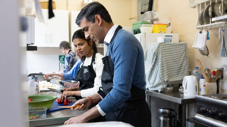 Prime Minister Rishi Sunak and his wife Akshata Murty help prepare food for a community group&#39;s lunch club at Mill End Community Centre, Rickmansworth, as part of the Big Help Out, to mark the crowning of King Charles III and Queen Camilla. Picture date: Monday May 8, 2023.