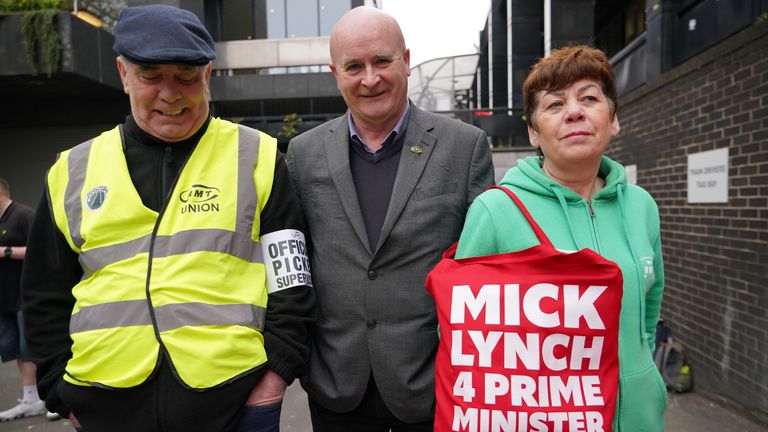 RMT general secretary Mick Lynch (centre) and striking railway workers in London Euston