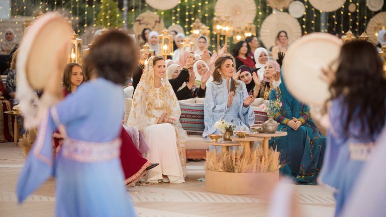 Queen Rania of Jordan sits next to bride-to-be Rajwa Al Saif, the youngest daughter of Saudi businessman Khaled Al Saif, during a dinner honoring the eldest son of Jordan's King Abdullah , Crown Prince Hussein and Rajwa Al Saif's upcoming wedding scheduled for June 1, in Amman, Jordan May 22, 2023. Queen Rania Media Office/Handout via REUTERS ATTENTION EDITORS - THIS IMAGE WAS PROVIDED BY A THIRD PARTY.  NO RESALE.  NO ARCHIVES