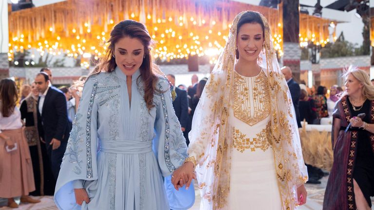 Queen Rania of Jordan walks with the bride-to-be Rajwa Al Saif, the youngest daughter of Saudi businessman Khaled Al Saif, during a dinner, in honor of the eldest son of King Abdullah of Jordan, Crown Prince Hussein and Rajwa Al Saif's upcoming wedding is scheduled for June 1 in Amman, Jordan, May 22, 2023. Queen Rania's Media Office/Handout via REUTERS ATTENTION EDITORS - THIS IMAGE WAS PROVIDED BY A THIRD.  NO RESALE.  NO ARCHIVES