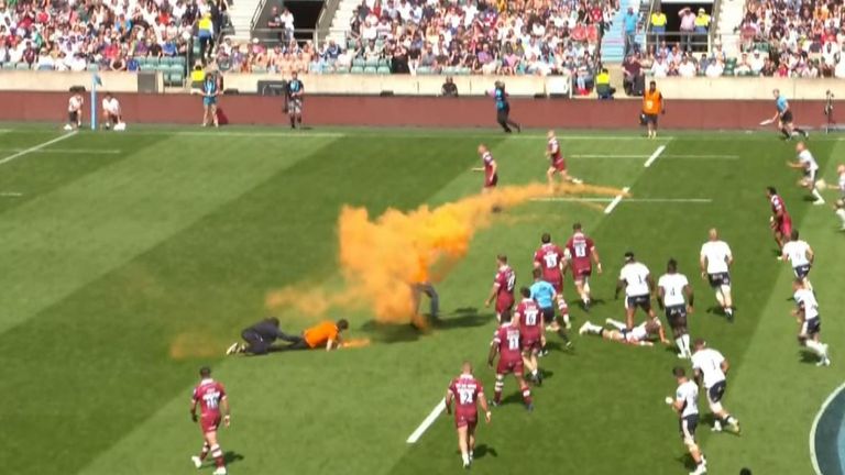 Just Stop Oil protesters invade pitch and throw orange powder at Twickenham rugby final.