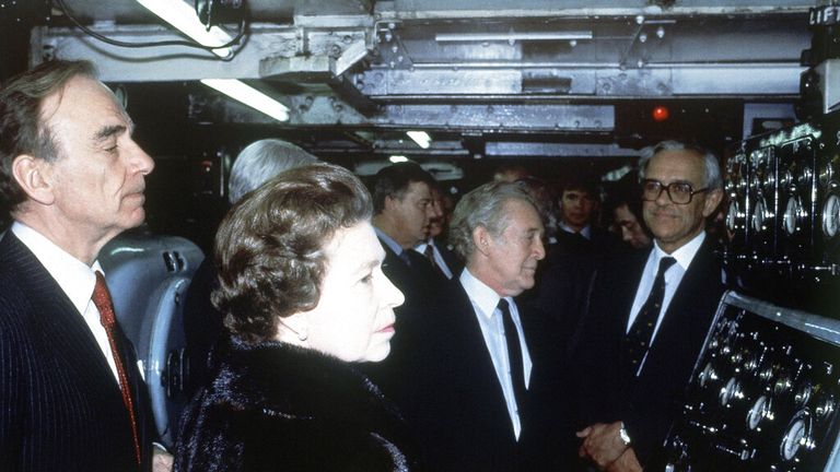 Murdoch and the late Queen Elizabeth II watching The Times go to press in 1985 in a royal visit to mark the newspaper&#39;s bicentenary Pic: AP 