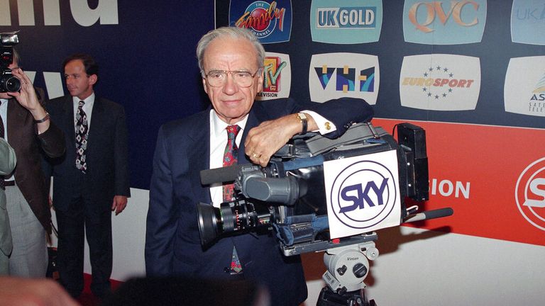 The media tycoon poses with a Sky camera during the launch of his multi-channel package in 1993 Pic: AP 