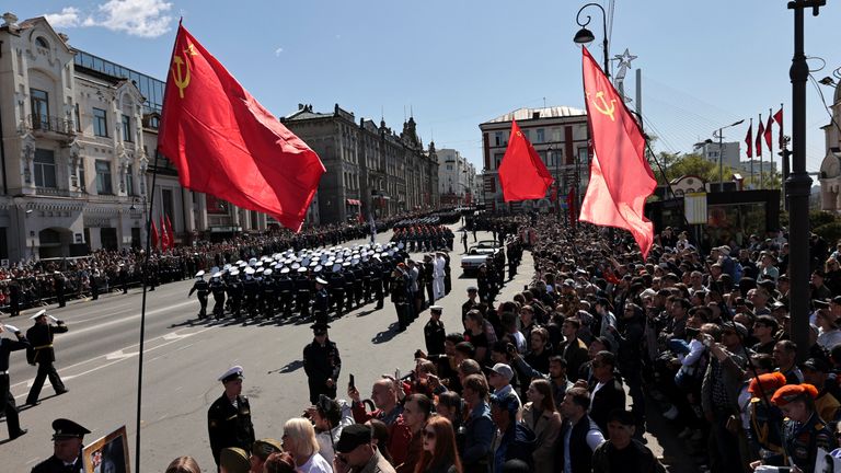 People watch a military parade during the celebrations of Victory Day, which marks the 78th anniversary of the victory over Nazi Germany in World War Two, in Vladivostok, Russia May 9, 2023. REUTERS/Tatiana Meel