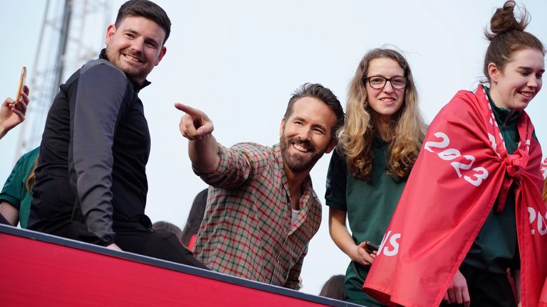 Wrexham co-owner Ryan Reynolds celebrates his team&#39;s promotion. Pic: AP