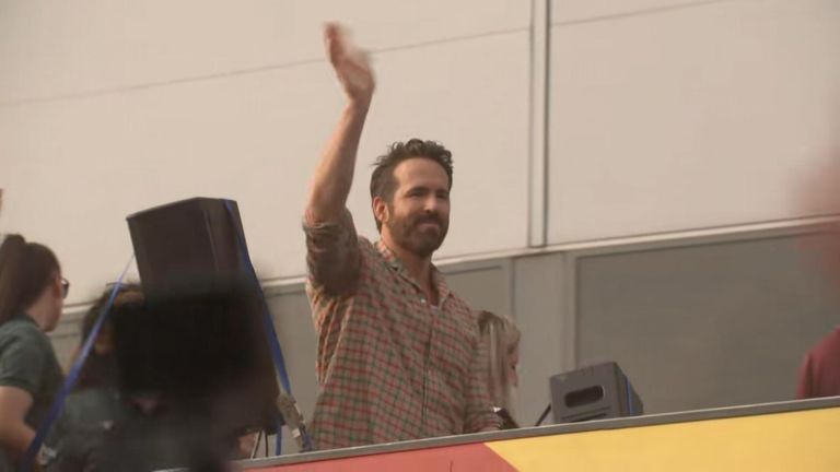 Ryan Reynolds and Rob McElhenney celebrate Wrexham AFC&#39;s promotion success with bus parade.
