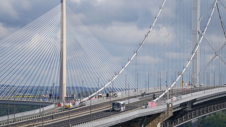 One of the new buses crosses the Forth Road Bridge in Scotland during the launch of the UK's first self-driving bus service. A convoy of five Alexander Dennis Enviro200AV vehicles will cross the Forth Road Bridge near Edinburgh, covering a 14-mile route, in mixed traffic at speeds of up to 50mph. Image date: Thursday, May 11, 2023.