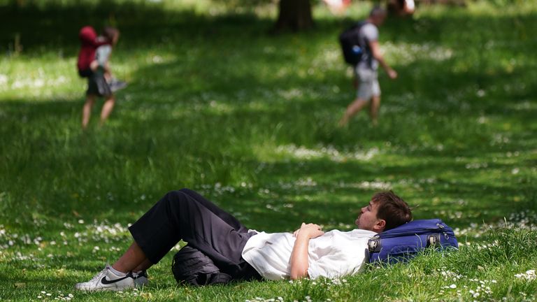 People embracing the warm Spring Bank Holiday weather in St James&#39;s Park, London. Pic: PA
