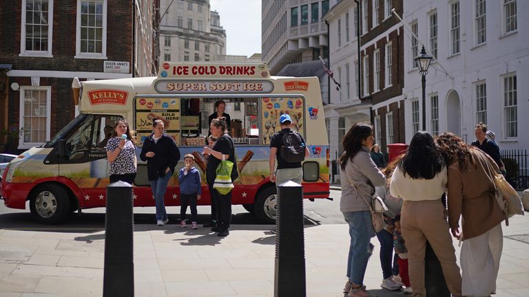 People buying ice cream from an ice cream van near St James&#39;s Park, London. Pic: PA