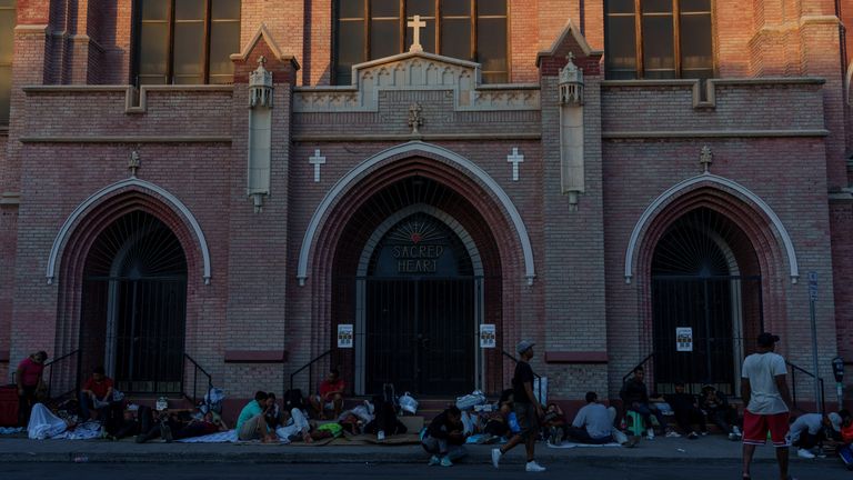 Migrants, mostly from Venezuela, are camped out in front of Sacred Heart Church i