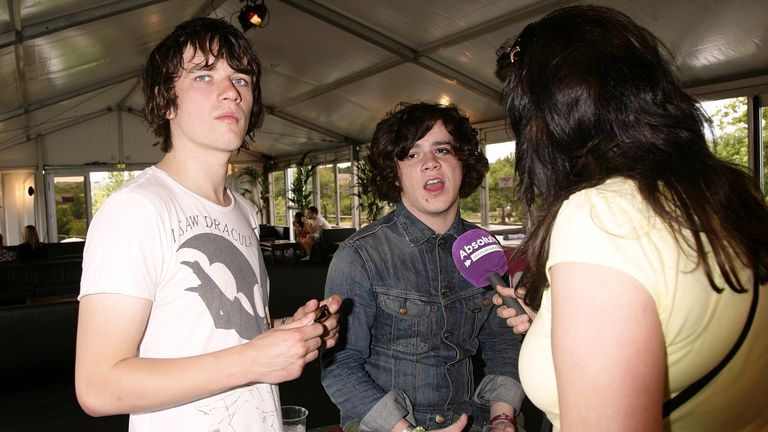 Kieren Webster (left) and Kyle Falconer (centre) of The View are interviewed backstage at the Isle of Wight festival, in Newport on the Isle of Wight.
