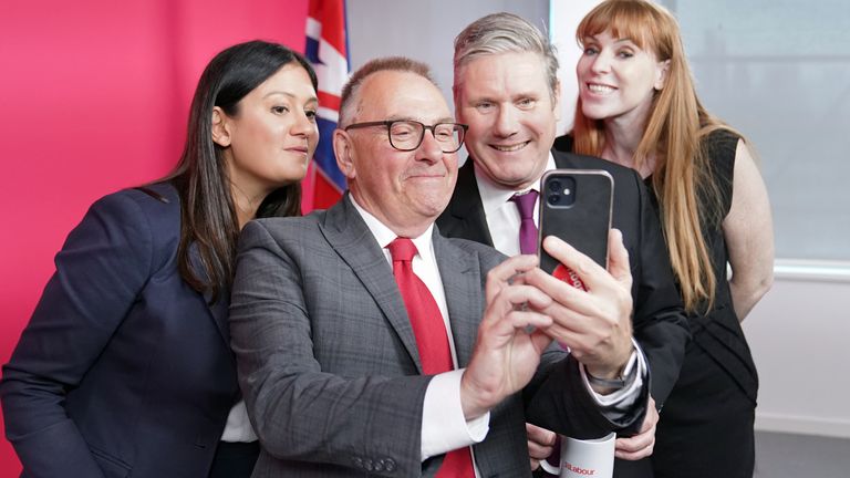 Plymouth City Council  leader Tudor Evans takes a selfie with (left to right) shadow levelling Up, housing and communities secretary Lisa Nandy,  Labour leader Sir Keir Starmer and deputy Labour Party leader Angela Rayner during a meeting of 22 new local council leaders at the headquarters of the Labour Party in London. Picture date: Tuesday May 9, 2023. PA Photo. See PA story POLITICS Elections Labour. Photo credit should read: Stefan Rousseau/PA Wire