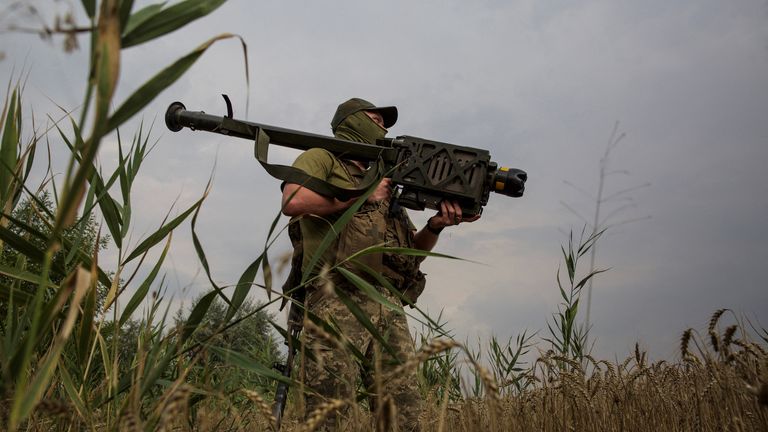 A Ukrainian serviceman holds a Stinger anti-aircraft missile at a position in a front line in Mykolaiv region, as Russia&#39;s attack on Ukraine continues, Ukraine August 11, 2022. REUTERS/Anna Kudriavtseva
