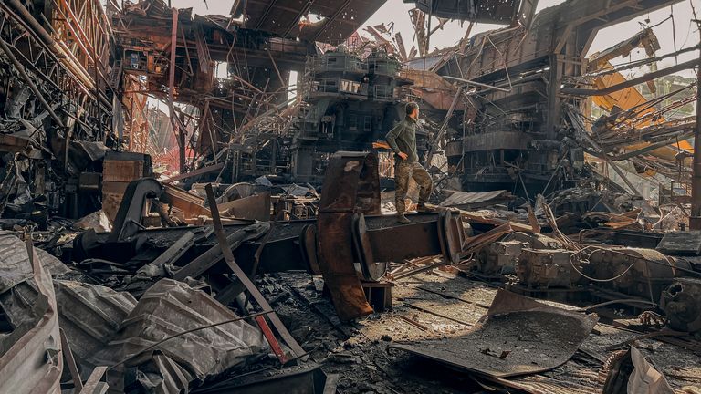 FILE - In this photo provided by the Azov Special Forces Regiment of the Ukrainian National Guard Press Bureau, a Ukrainian soldier stands inside the ruined Azovstal Steel Plant before surrendering to forces in Mariupol, Ukraine, May 16, 2022. (Dmytro Kozatsky/ Azov Special Forces Regiment of the Ukrainian National Guard Press Office via AP, file)