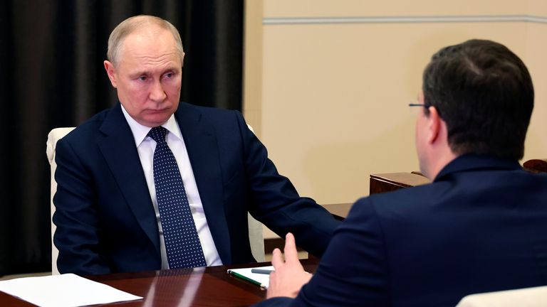 Russian President Vladimir Putin listens to the Governor of the Nizhny Novgorod Region, Gleb Nikitin, during their meeting at the Novo-Ogaryovo residence outside Moscow, Russia, Wednesday, May 3, 2023. (Mikhail Klimentyev, Sputnik, Kremlin Pool Photo via AP)


