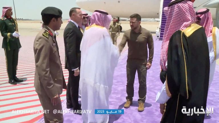 Ukrainian President Volodymyr Zelenskyy is welcomed as he arrives ahead of the Arab League summit, in Jeddah, Saudi Arabia  