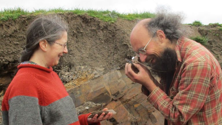 EMBARGOED TO 1600 MONDAY MAY 1 Undated handout photo of a Lucy Muir and Joe Botting examining a fossil specimen at Castle Bank. A large number of extraordinary new fossils, including many soft-bodied creatures, have been discovered near Llandrindod Wells in Powys. Issue date: Monday May 1, 2023.