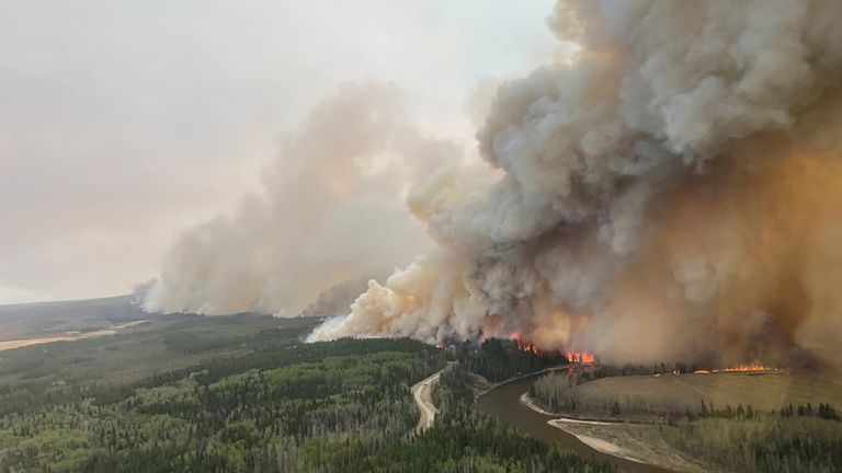 A column of smoke rises from the EWF031 wildfire near Lodgepole, Alberta, Canada May 4, 2023. Alberta Wildfire/Handout via REUTERS THIS IMAGE HAS BEEN PROVIDED BY A THIRD PARTY.  TPX IMAGES OF THE DAY