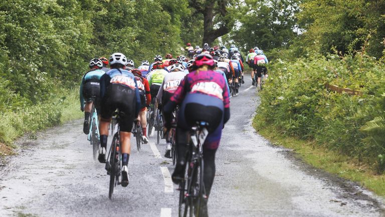 Women&#39;s elite riders battling with heavy rain and wind during the 2022 British National Road Championships road race, beginning at Castle Douglas 
