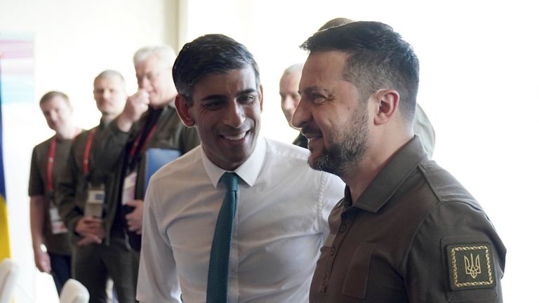 Britain&#39;s Prime Minister Rishi Sunak, left, and Ukraine President Volodymyr Zelenskyy meet at the Grand Prince Hotel, during the G7 Summit in Hiroshima, Japan, Saturday, May 20, 2023. (Stefan Rousseau/Pool via AP)