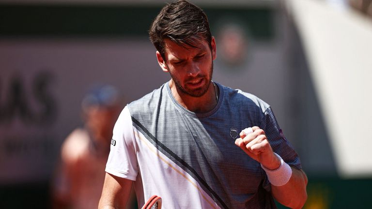 Britain&#39;s Cameron Norrie reacts as he plays against France&#39;s Benoit Paire during their men&#39;s singles match on day two of the Roland-Garros Open tennis tournament at the Court Suzanne-Lenglen in Paris on May 29, 2023. (Photo by Anne-Christine POUJOULAT / AFP) (Photo by ANNE-CHRISTINE POUJOULAT/AFP via Getty Images)