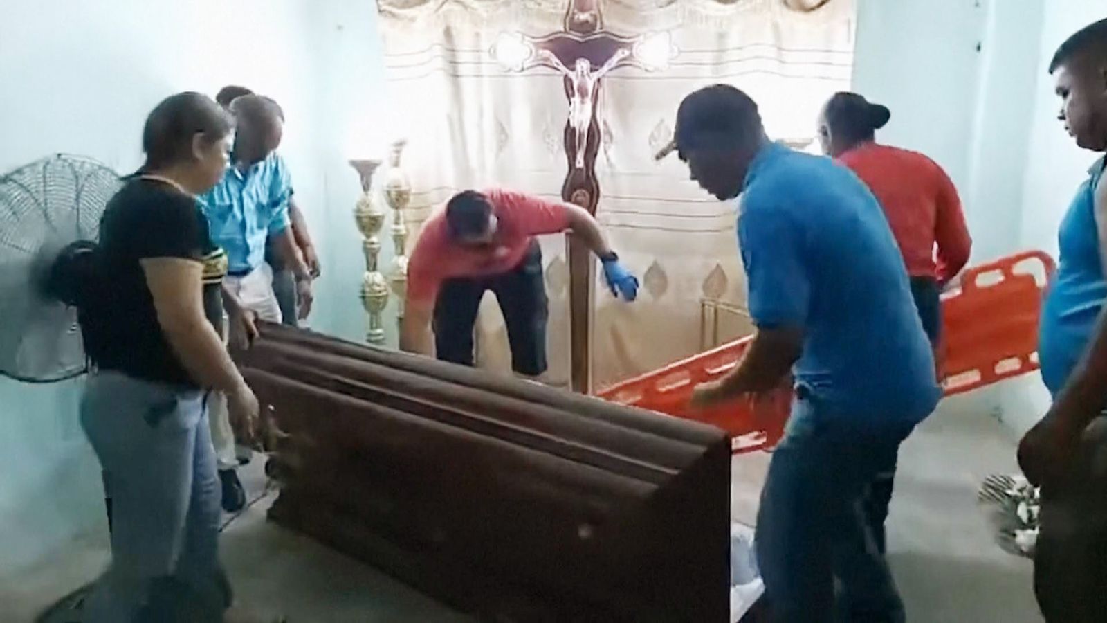 Woman who knocked on coffin during her own funeral has died