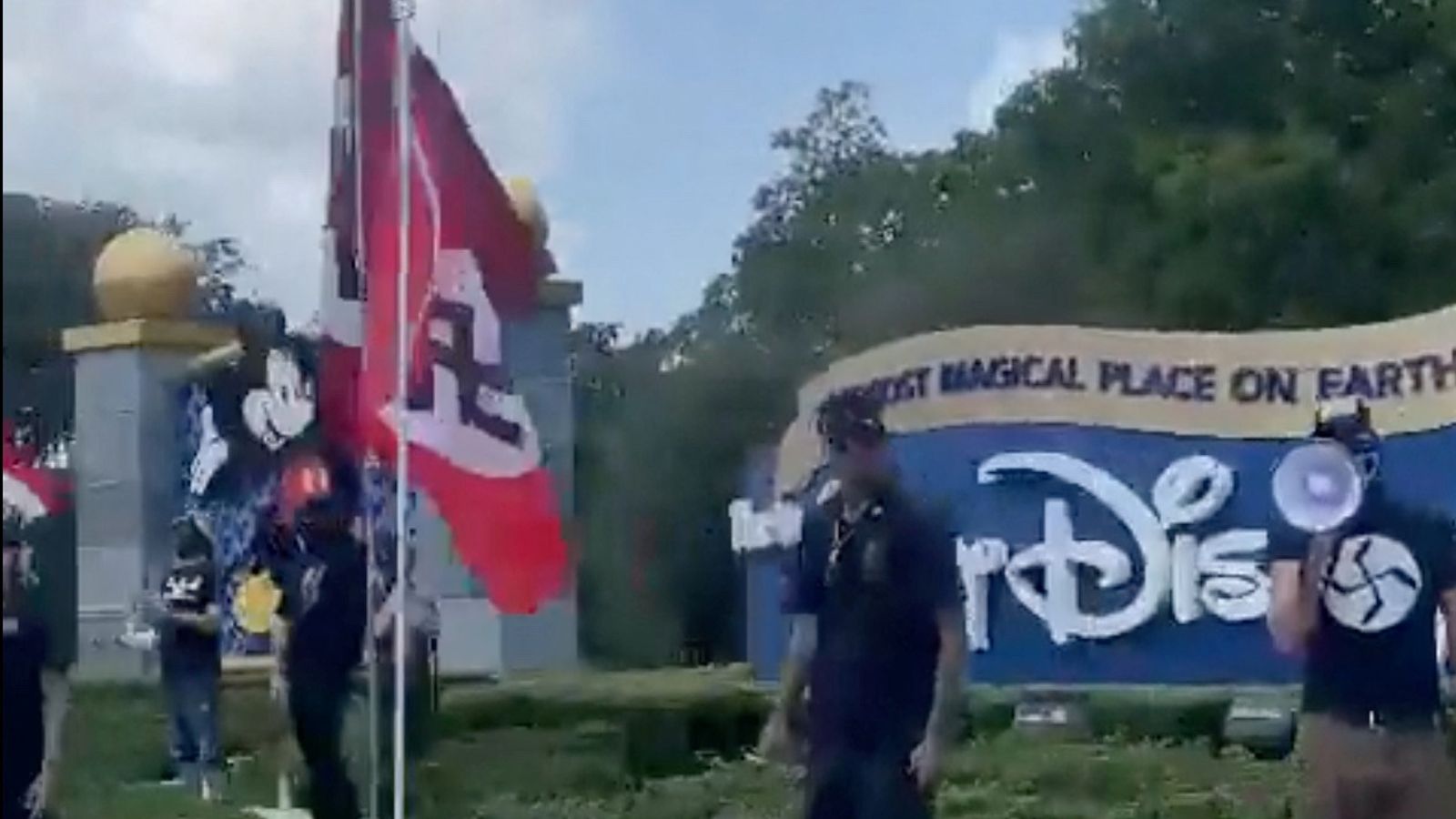 Nazi protesters wave swastika flags outside Disney World