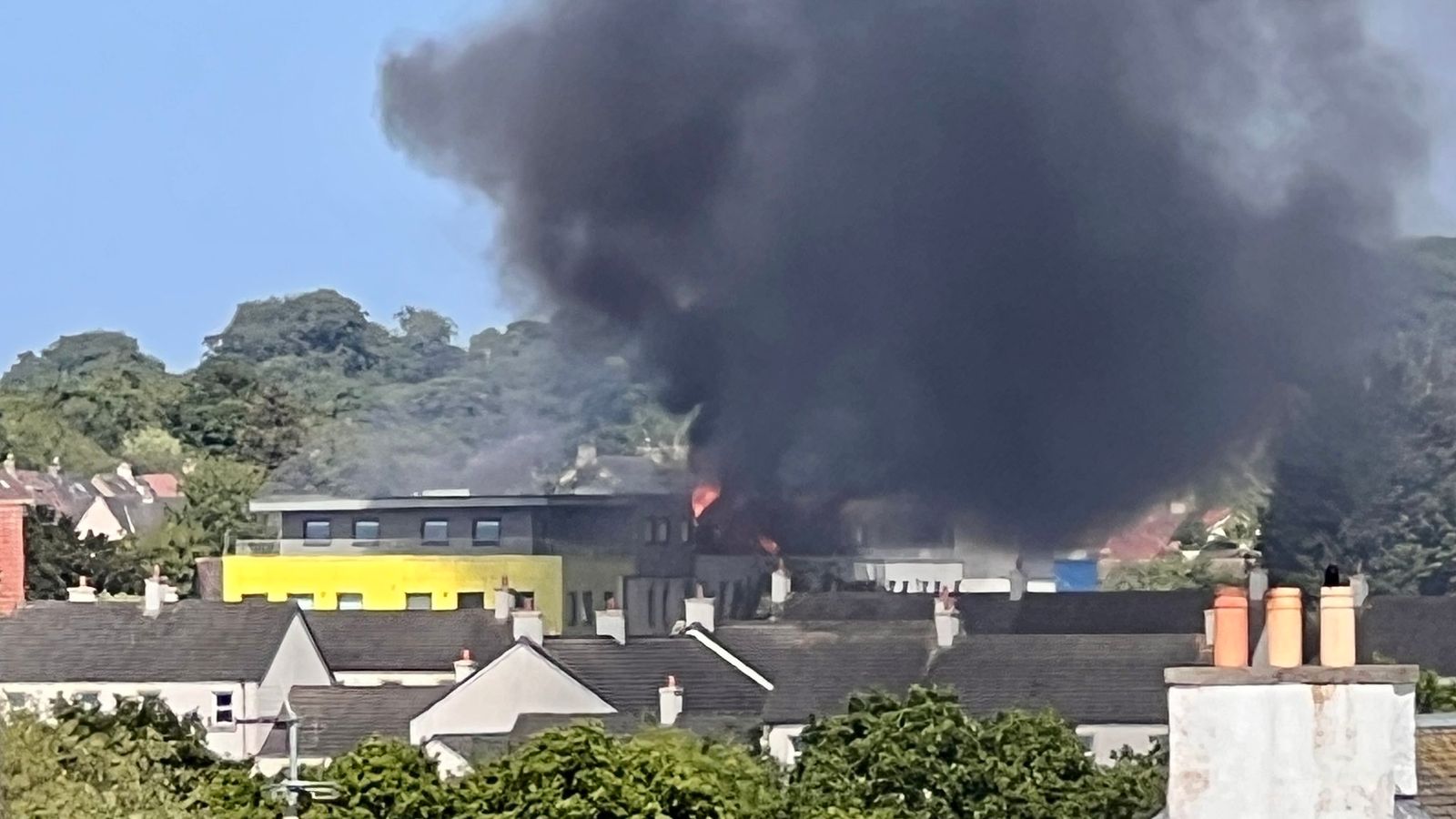 Edinburgh school evacuated as fire crews battle blaze at block of flats