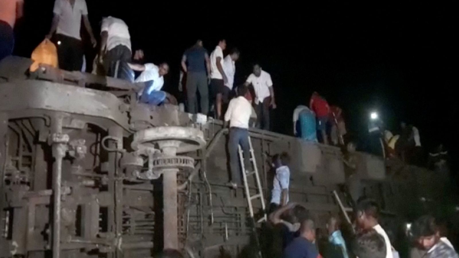 India train crash: At least 50 people feared dead and hundreds injured