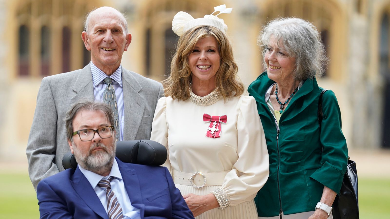 Kate Garraway joined by husband Derek Draper as she collects MBE from Prince William