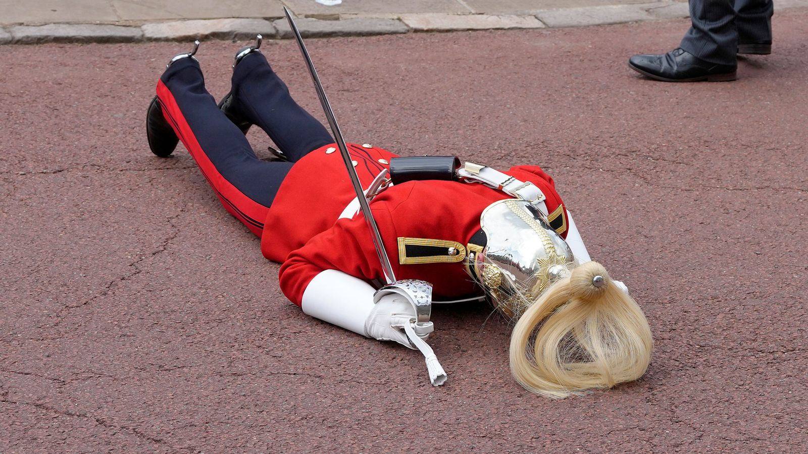 Soldier helped by police after fainting at King's first Order of