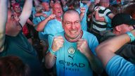 Manchester City fans celebrate full time at the Love Factory in Manchester