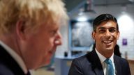 Britain&#39;s Prime Minister Boris Johnson and Britain&#39;s Chancellor of the Exchequer Rishi Sunak visit the headquarters of Octopus Energy, in London, Britain October 5, 2020. Leon Neal/Pool via REUTERS