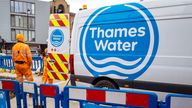 Thames Water workers repairing broken underground water pipes.