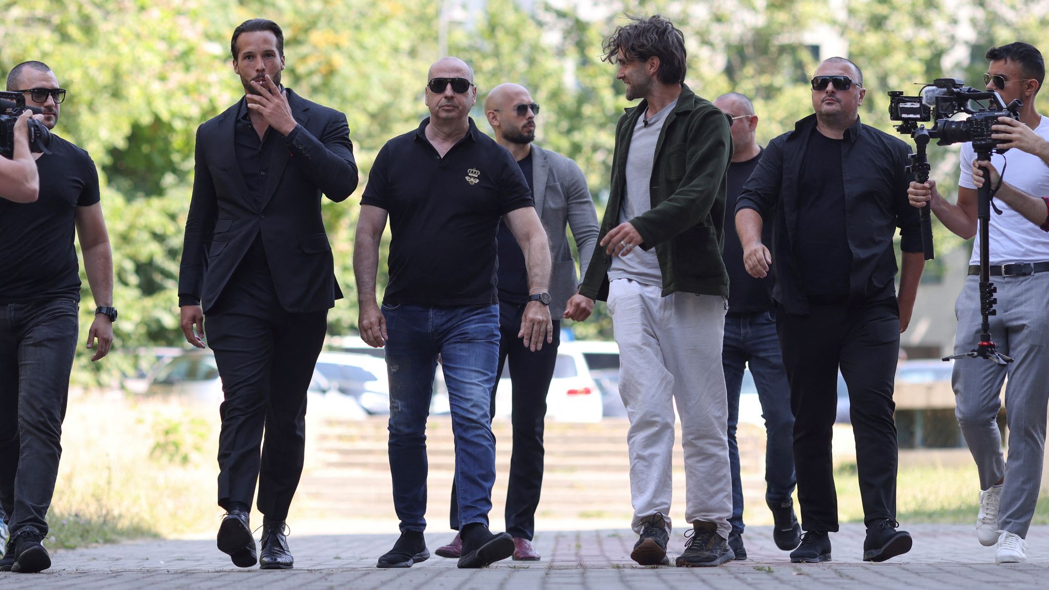 Andrew Tate and brother at court over human trafficking allegations