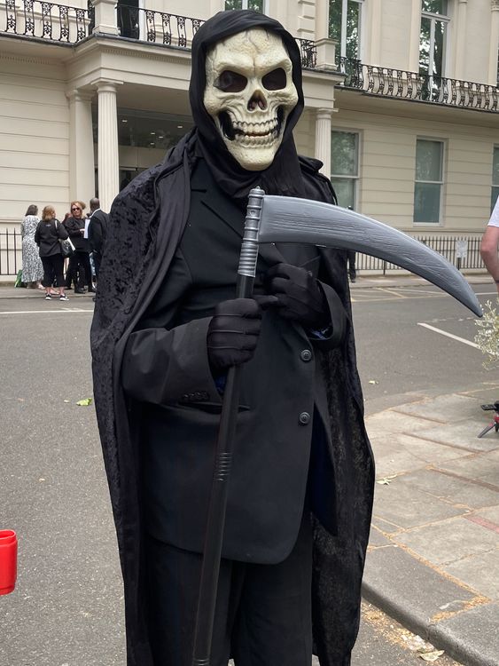 Bereaved family member Charles Persinger, 58, dressed up as the Grim Reaper to confront former health secretary Matt Hancock as he left the Covid-19 Inquiry 