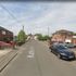 Woman in her 70s dead after dog attack - as two people arrested