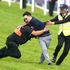 Protester runs on during race as 31 held over Epsom Derby disruption