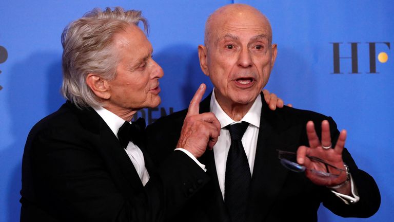 Michael Douglas  and Alan Arkin pose backstage.  