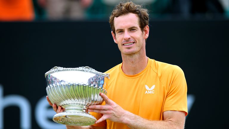 Andy Murray holds the trophy after victory at the Nottingham Open