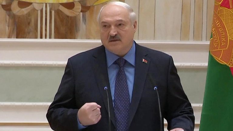 Belarusian President Alexander Lukashenko gestures during the state address 