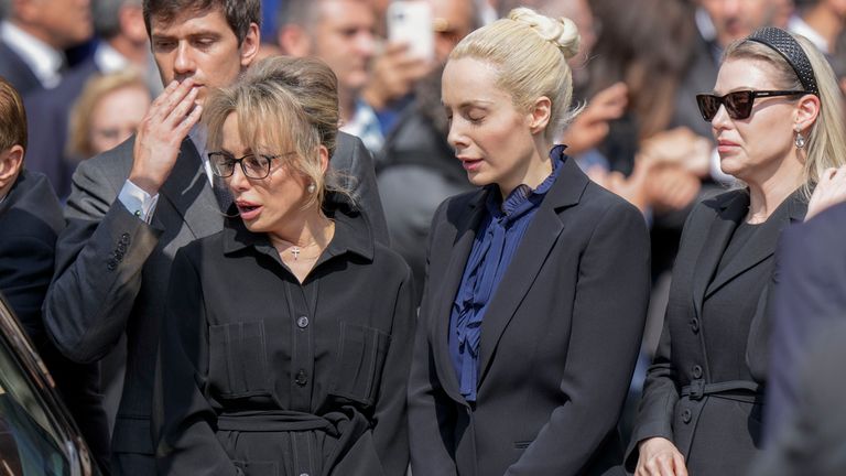 (L-R) Berlusconi&#39;s son, Luigi; daughter, Marina; partner Marta Fascina, and daughter Barbara seen paying their respects Pic: AP 