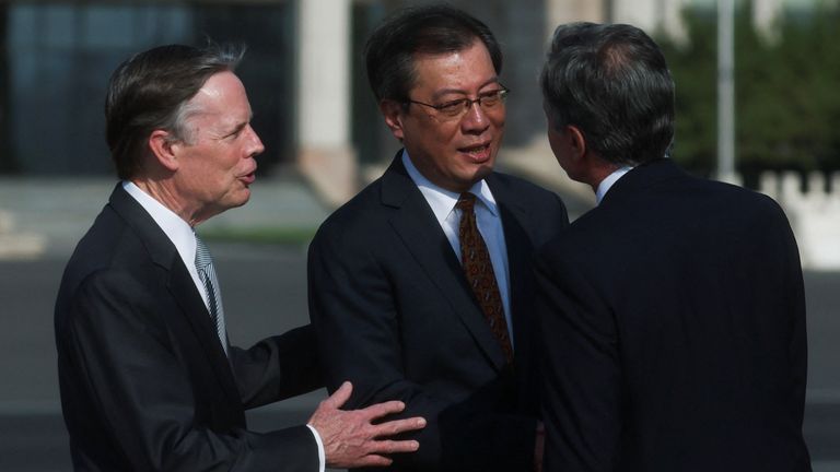 U.S. Secretary of State Antony Blinken is welcomed by Director General of the Department of North American and Oceanian Affairs of the Foreign Ministry Yang Tao and U.S. Ambassador to China Nicholas Burns, as he arrives in Bejing, China, June 18, 2023. REUTERS/Leah Millis/Pool
