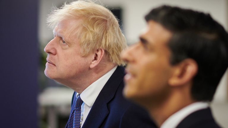File photo dated 05/10/20 of Prime Minister Boris Johnson and Chancellor of the Exchequer Rishi Sunak during a visit to the headquarters of Octopus Energy in London. December 13th 2020 marks the first anniversary of Mr Johnson&#39;s General Election win.