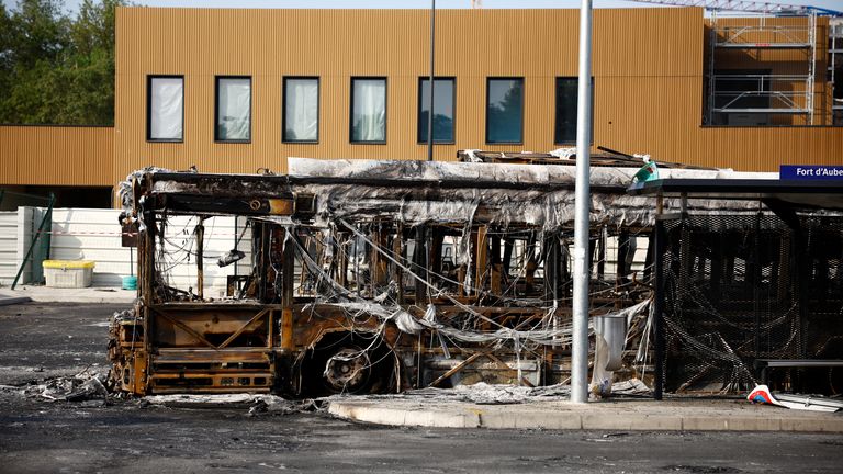 View of a burnt bus at a RATP bus depot damaged during night clashes between protesters and police, following the death of Nahel, a 17-year-old teenager killed by a French police officer in Nanterre during a traffic stop, in Aubervilliers, near Paris, France, June 30, 2023. REUTERS/Sarah Meyssonnier
