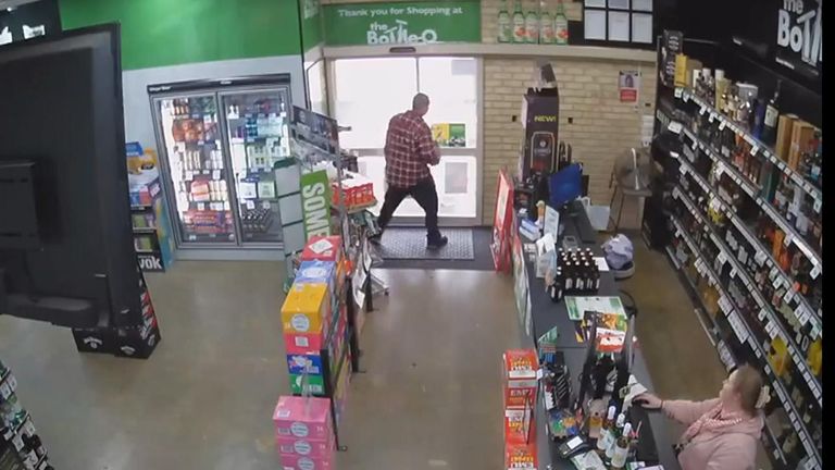 Suspect is prevented from shoplifting by locked door
